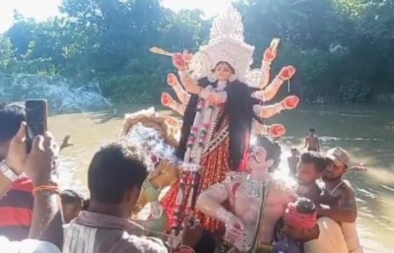 Durga Puja 2021 : Vijaya Dashami Yatra Continues in Tripura : Immersion at Agartala Dashamighat going on Peacefully amid Tight Security Arrangements, Merry-Making and Dances Durga Puja 2021 : Vijaya Dashami Yatra Continues in Tripura : Immersion at Agartala Dashamighat going on Peacefully amid Tight Security Arrangements, Merry-Making and Dances